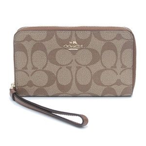 COACH NWT Phone Wallet In Signature Coated Canvas